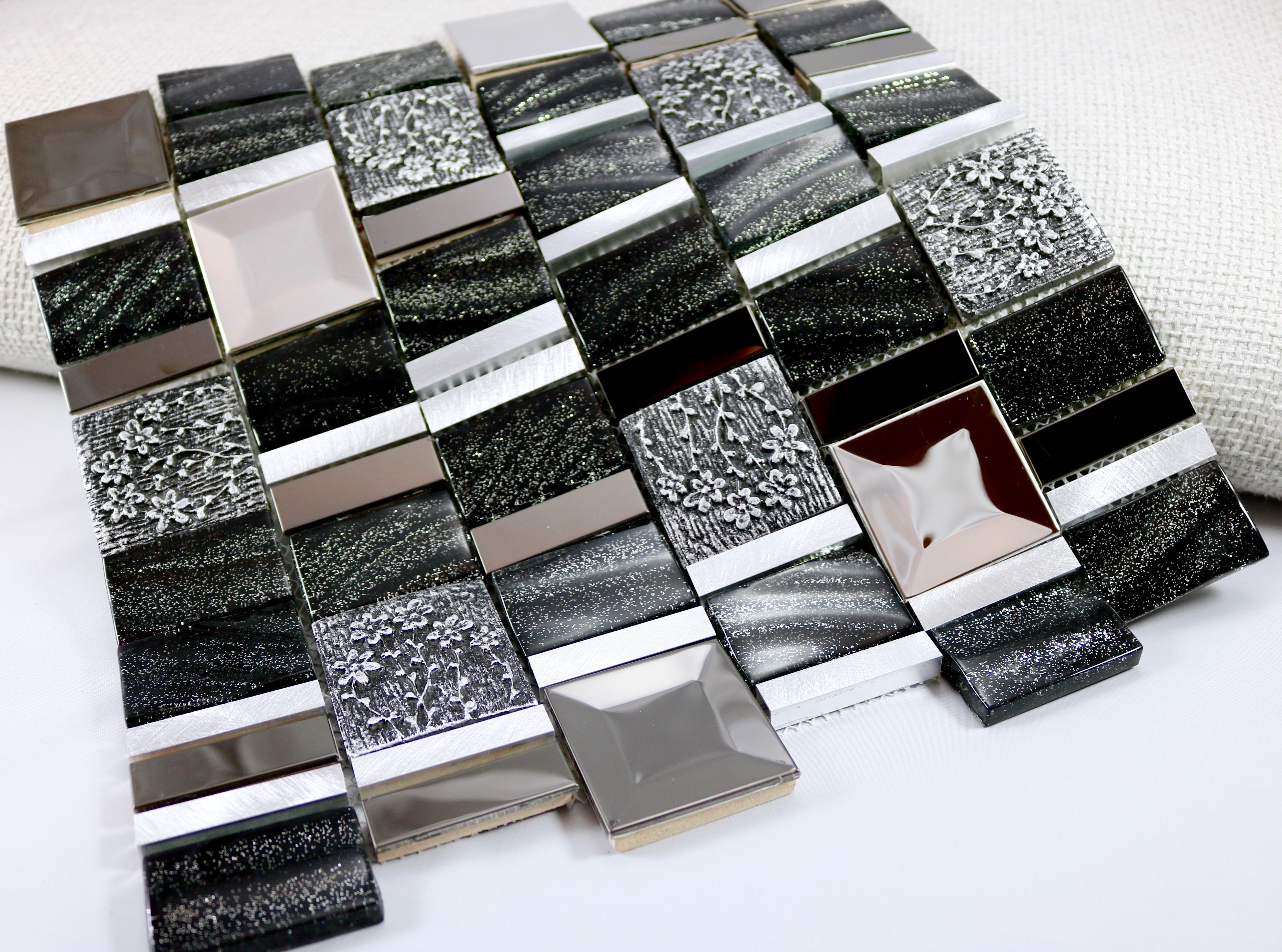 Dark and shiny stainless steel, hand painted ceramics, aluminum, and black sequined glass / Interlocking Vitray Series 0